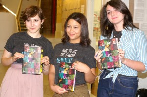 Students Hold Copy of "Girls Like Us" by Rachel Lloyd