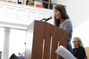 Here I am reading my personal essay on race, class, and gender on our International Day of the Girl assembly  (photo credit: Lexie Clinton). 