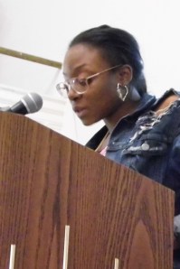 Reading my personal essay during our school's assembly on International Day of the Girl (photo credit: Lexie Clinton).