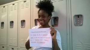 Me, holding my ' I Need Feminism Because...' sign on our last day of class :) Photo Cred: Ileana Jimenez